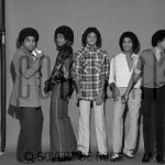 03-02-1979 Jackson 5, Michael, Jermaine, Marlon, Jackie and Tito Jackson at studio in Amsterdam, The Netherlands.

[keywords]Black & White Image, Posed, Full Length[/keywords]